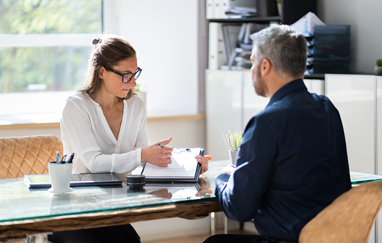 businesswoman and man having a meeting