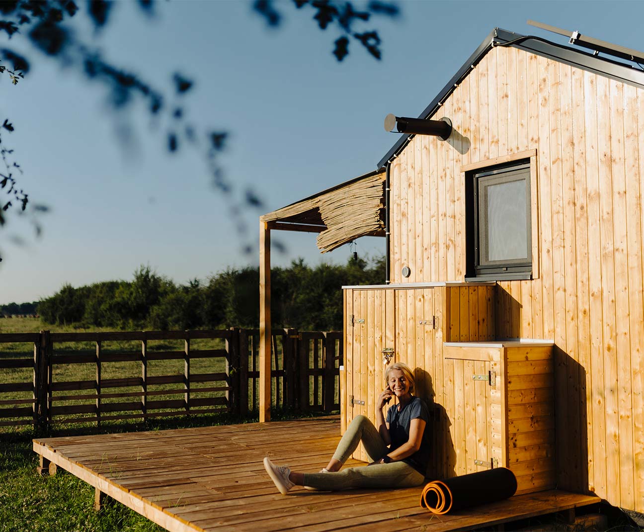 person relaxing on porch