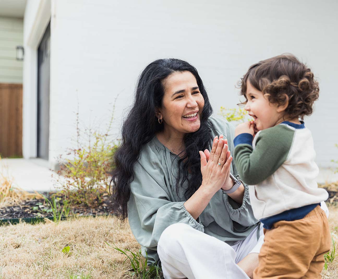 mother and son in yard