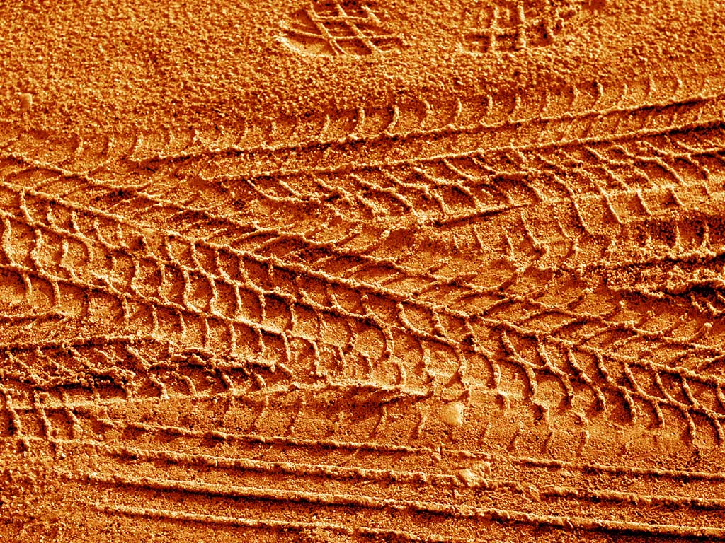 macro image of dirt tracks