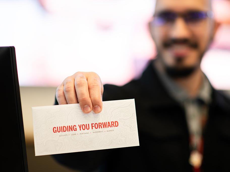 Man holding cash envelope