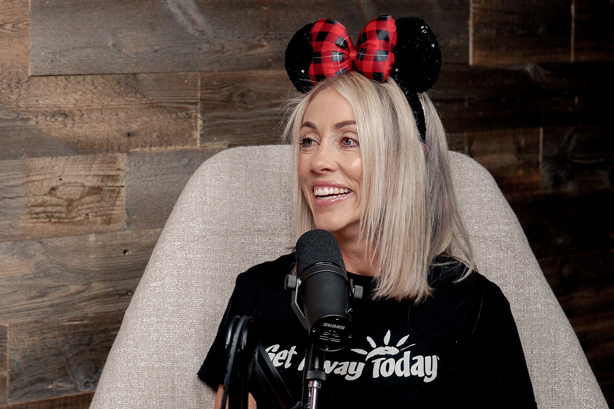 woman wearing holiday mouse ears