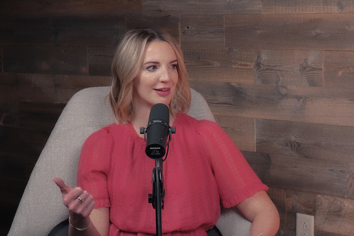 Woman talking into microphone