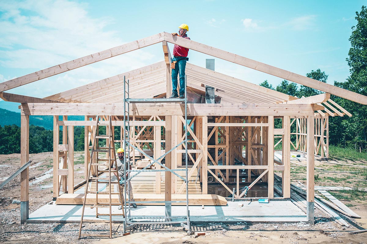 construction workers building a house