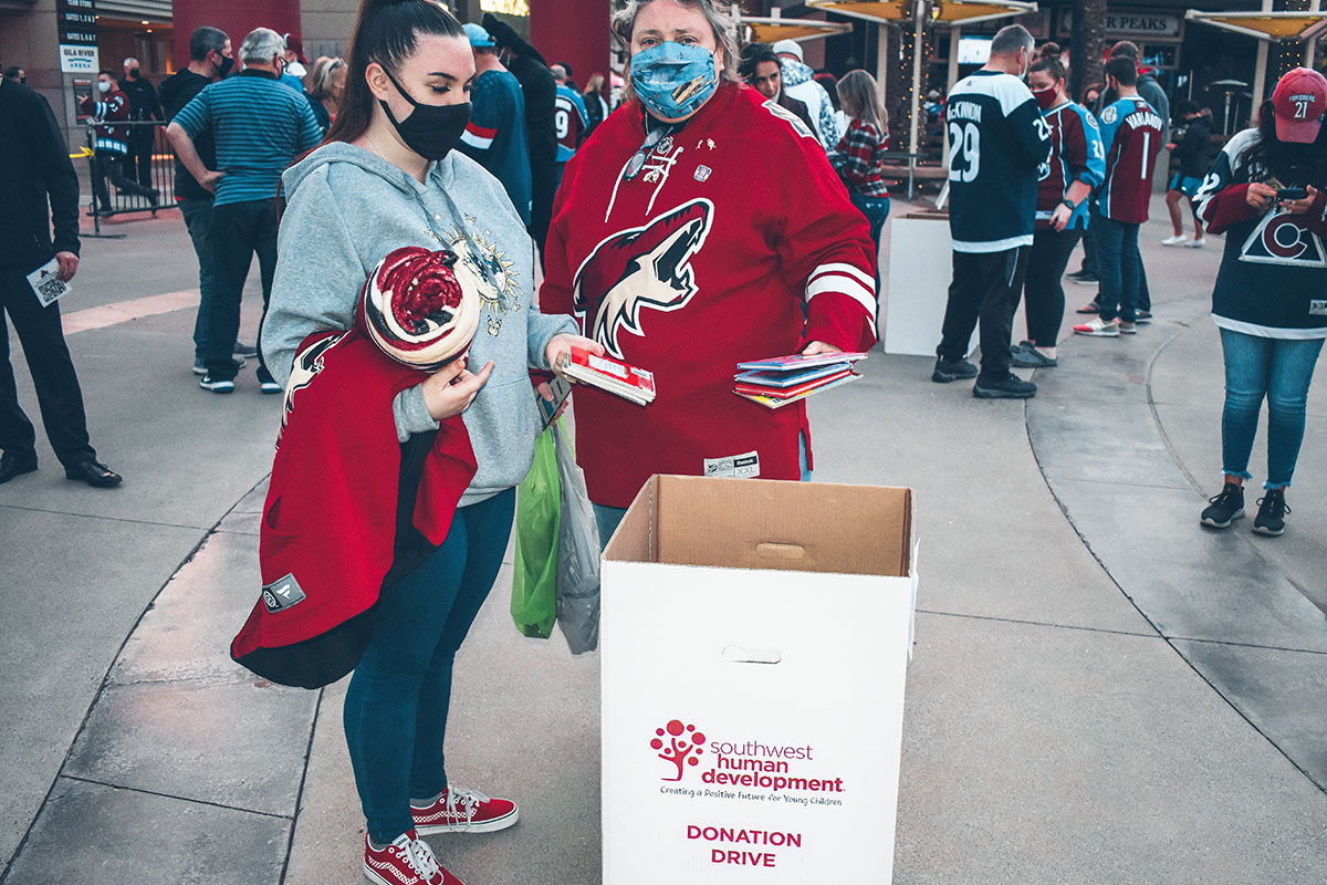 people at a book donation drive