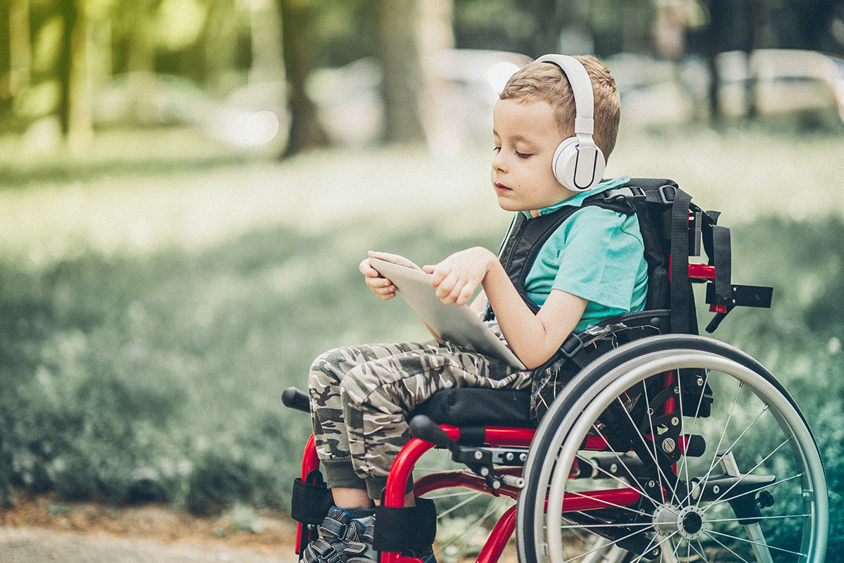 little boy in a wheelchair
